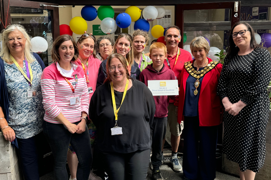 On Track Barnstaple team receiving their Thrive School of Excellence award